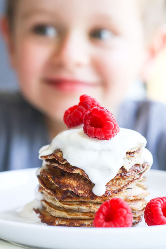 Child Looking at a Stack of Banana Pancakes