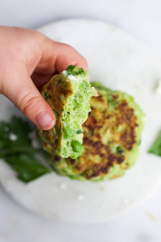 Pea Fritter with Bite Out Held to Camera