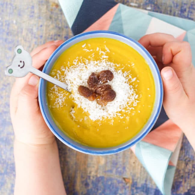 curried lentil and coconut soup. A deliciously spiced soup with sweet toppings to complement the spices. A fun and delicious soup for kids.