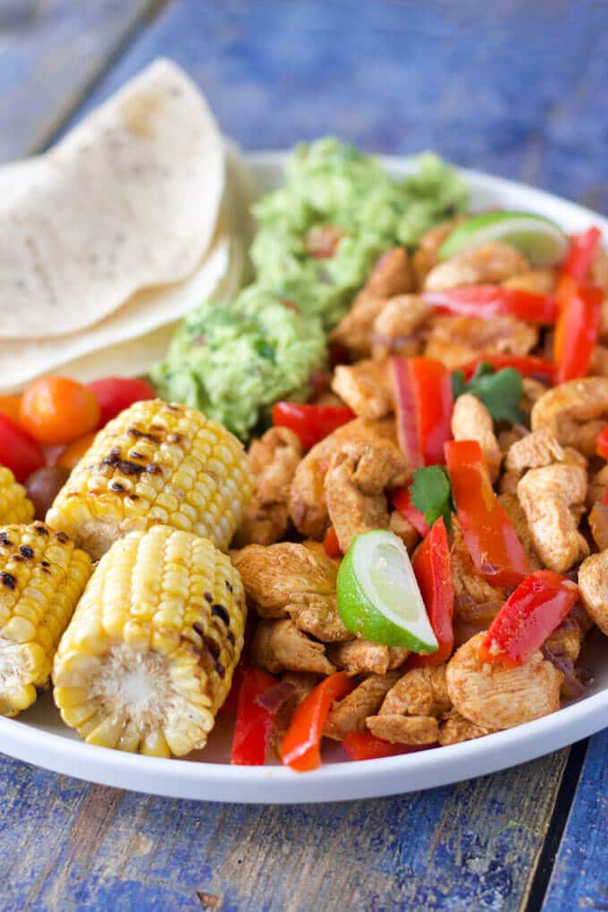 chicken fajitas are a fun and interactive meal for kids. Serve with a range of veggies, dips and sauces and let your kids build their own. 