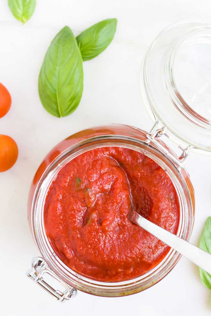 Top Down View of Pizza Sauce in Glass Jar