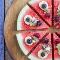 watermelon pizza is a refreshing, fun and healthy snack / dessert for kids. Let kids choose their toppings.