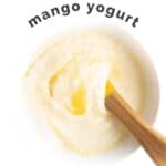 Mango Yogurt Pinterest Pin. Bowl of Mango Yogurt with Text OVerlay "Fruit Sweetened Mango Yogurt"