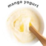 Mango Yogurt Pinterest Pin. Bowl of Mango Yogurt with Text OVerlay "Fruit Sweetened Mango Yogurt"