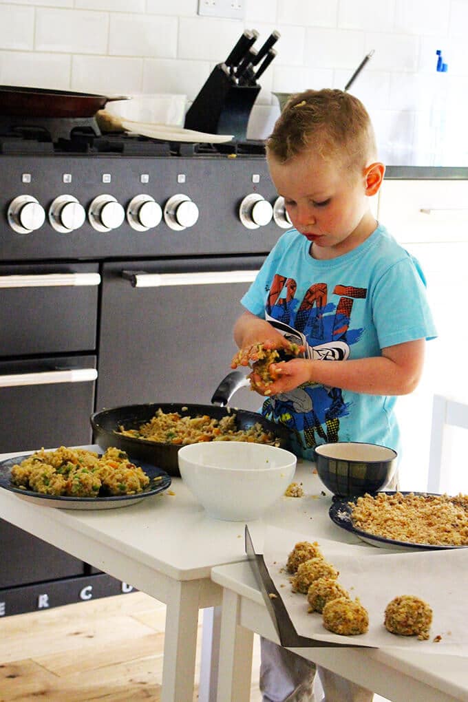 Child making risotto balls