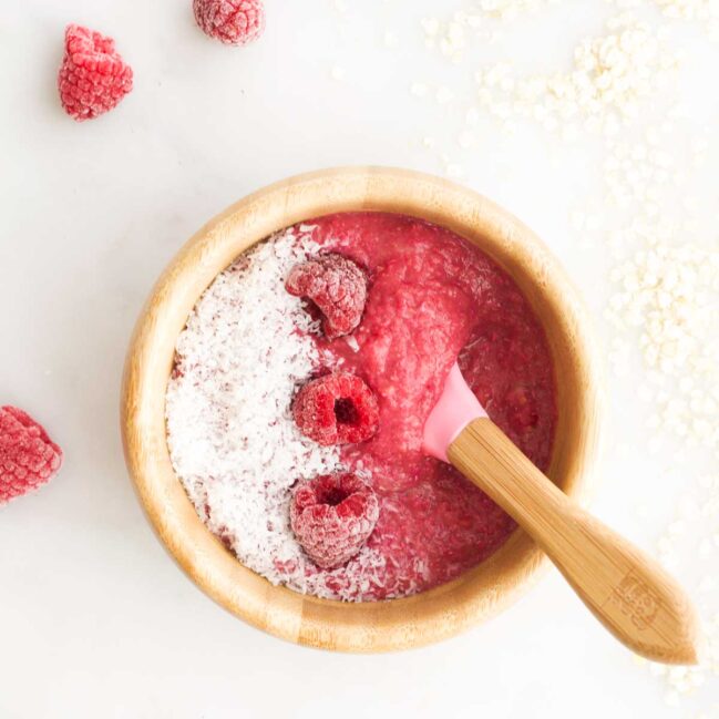 Top Down View of Raspberry Quinoa Porridge in Baby Bowl