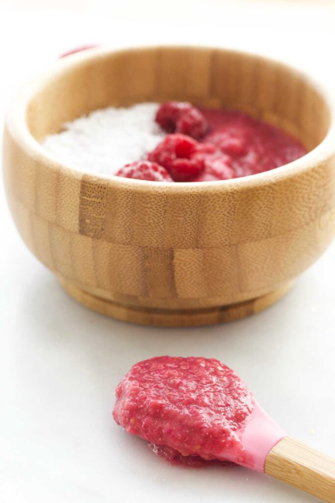 Side Shot of Raspberry Quinoa in Bowl with Spoonful in Front