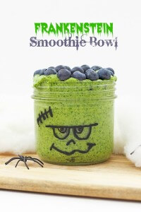 Frankenstein Smoothie Bowl (healthier halloween snacks for kids) Spinach, banana and mango blended together and topped with blueberries