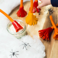 These Witches broomsticks are a perfect healthy halloween snack. Made from carrot and peppers.