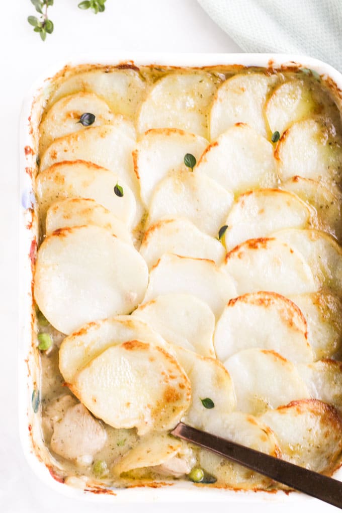 Baked Chicken Potato Bake with Spoon Taking Serving