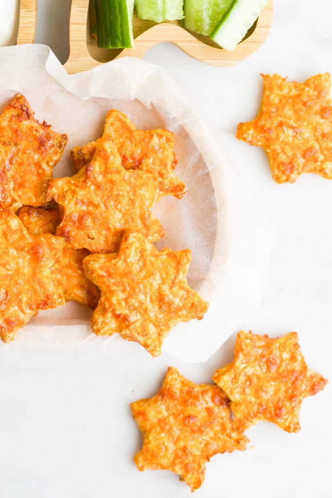 Carrot Stars Bites on a Toddler Plate with Extra Around the Side of the Plate