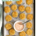 Pinterest Pin with Image of Baked Veggie Nuggets on Baking Sheet with Text Overlay "Bean & Veggie Nuggets".