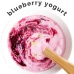 Blueberry Yogurt Pinterest Pin. Bowl of Blueberry Yogurt with text overlaty "fruit sweetened blueberry yogurt)