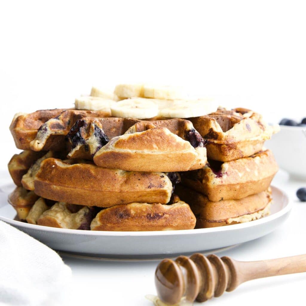 Stack of Banana Waffles Topped with Banana Slices