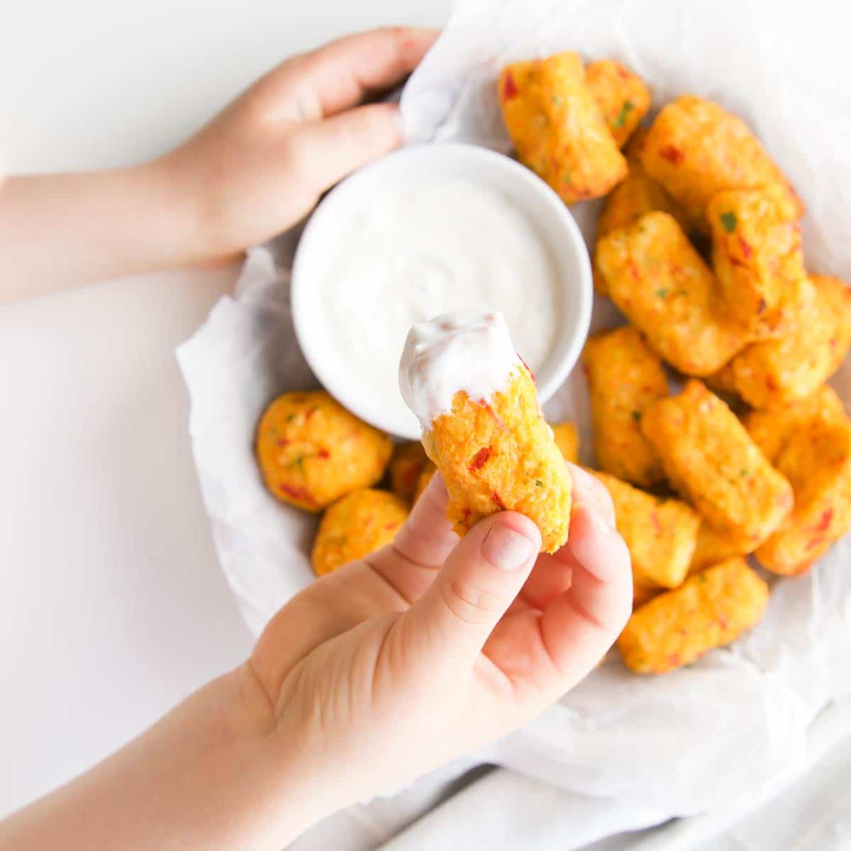 https://www.healthylittlefoodies.com/wp-content/uploads/2017/05/cauliflower-tots-dip.jpg