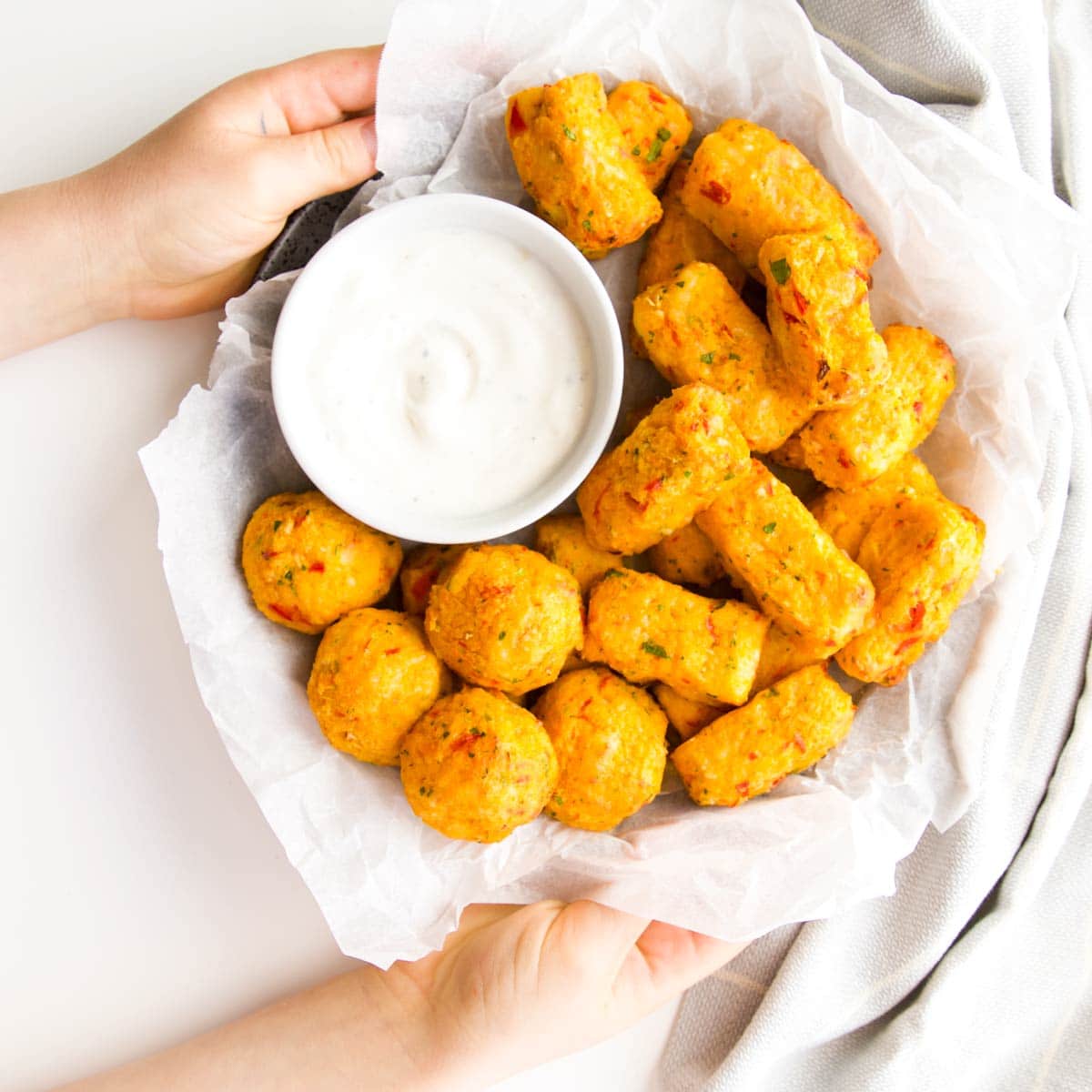 Top Down Shot of Plate of Cauliflower Tots Served with a Yogurt Dip