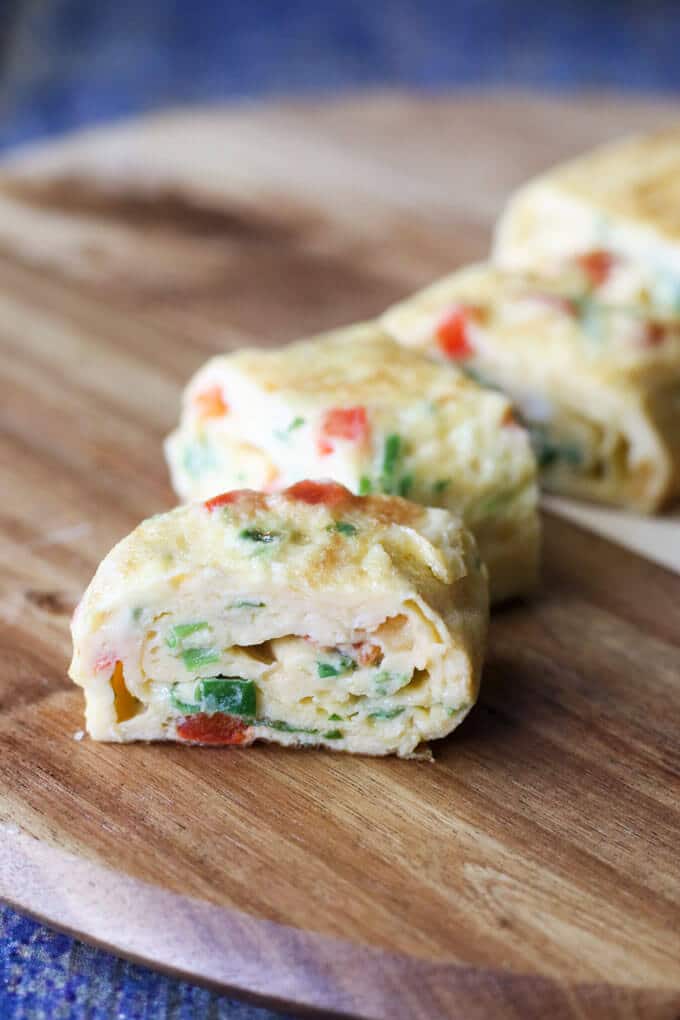 Little egg rolls are a perfect finger food for kids. Great for baby-led weaning or for adding to a lunch box. A dd your favourite omelette add ins. 