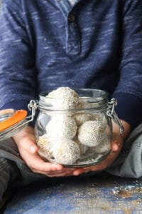 Tropical oat balls a great kids snack made from pats, linseed, pineapple, coconut, ginger and apricot. A great finger food for kids. Suitable for the lunchbox. Nut free, dairy free.