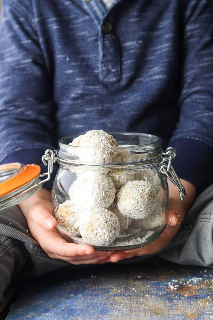Tropical oat balls a great kids snack made from pats, linseed, pineapple, coconut, ginger and apricot. A great finger food for kids. Suitable for the lunchbox. Nut free, dairy free.
