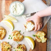 A delicious side dish for the whole family to enjoy, these Smashed Potatoes with a Lemon Herb Dip are great for little hands to pick up.
