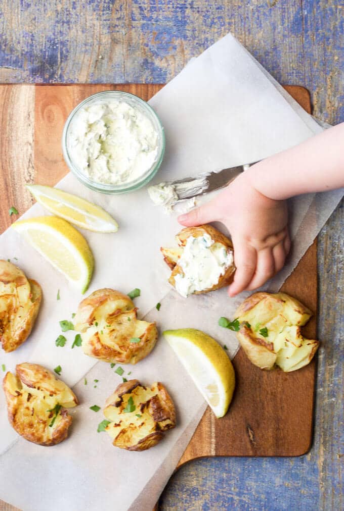 A delicious side dish for the whole family to enjoy, these Smashed Potatoes with a Lemon Herb Dip are great for little hands to pick up. 