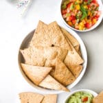 Bowl of Tortilla Chips with Guacamole and Fruit Salsa Dip