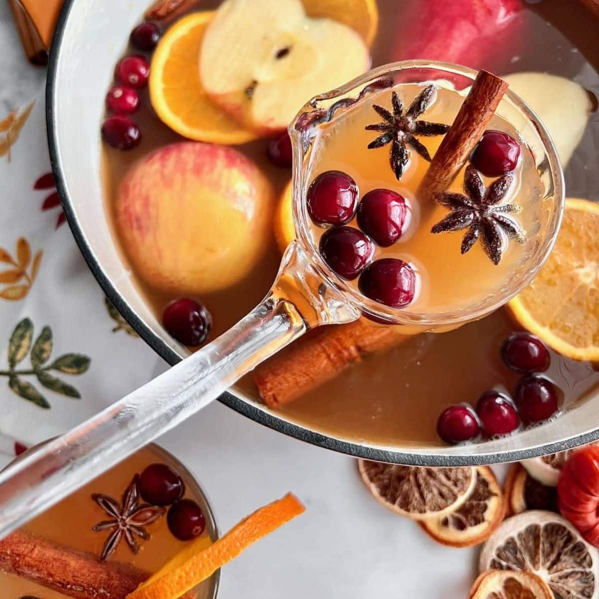 Bowl of Apple Punch Filled with Fruit.