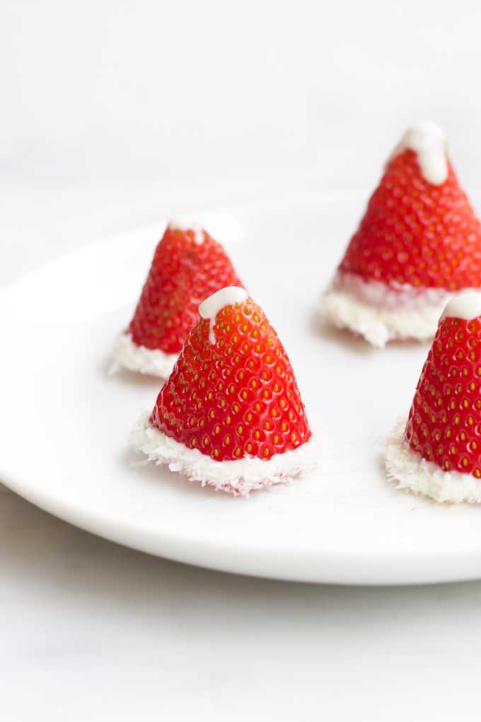 Strawberry Santa Hats on White Plate