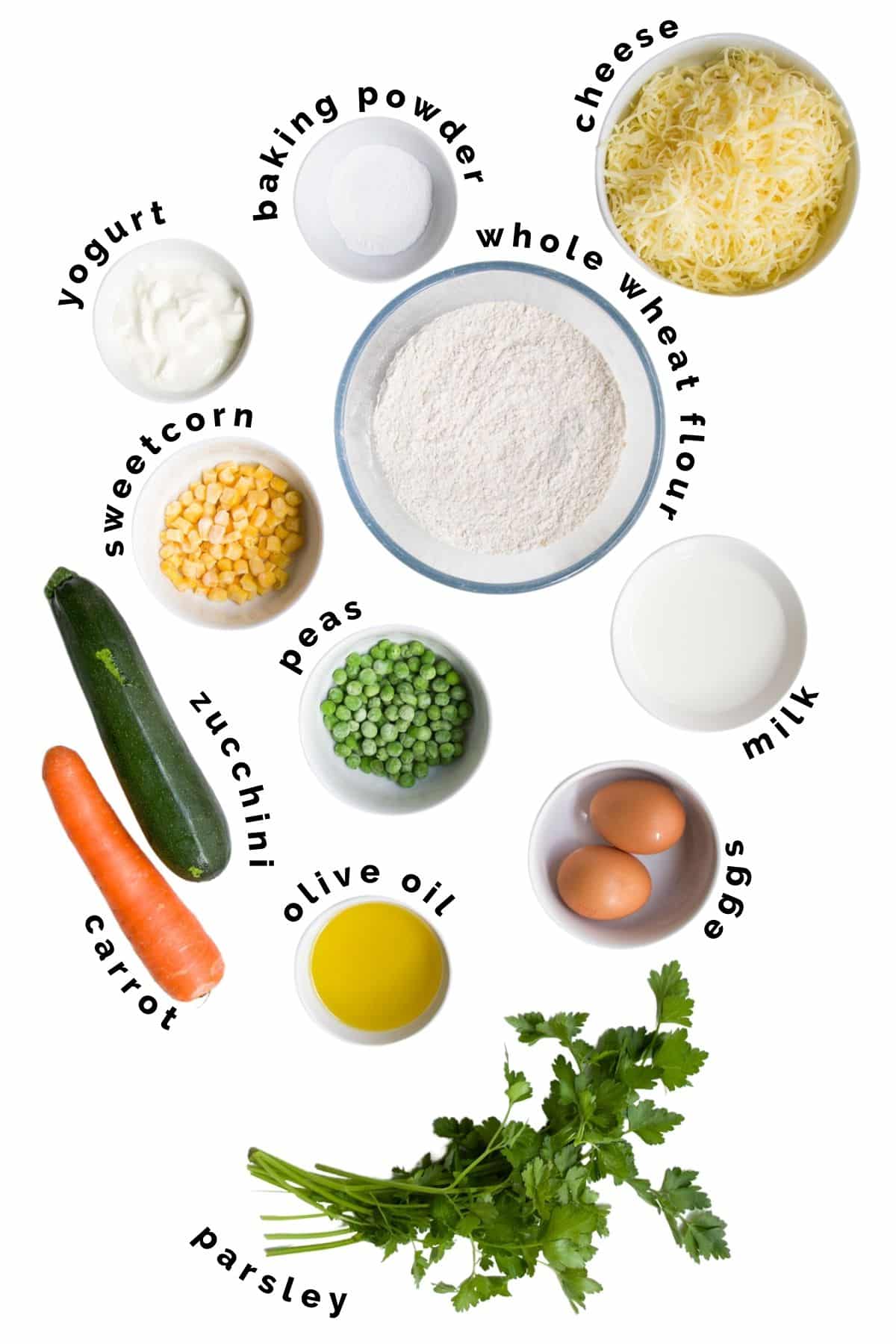 Flat Lay of Ingredients Needed to Make Savoury Vegetable Muffins.