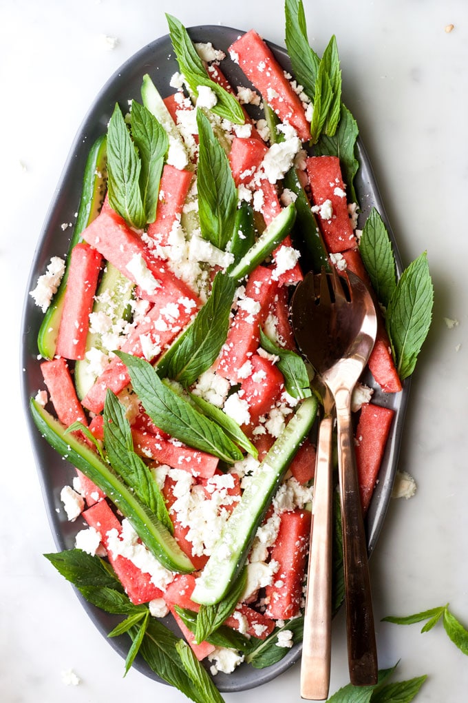 watermelon feta mint salad on serving plate