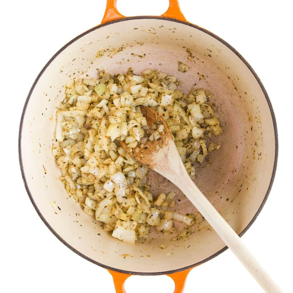 Sauteed Onion, Garlic and Italian Herb Mixture in Pan.