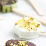 A DELICIOUS and HEALTHY dessert or snack for kids. Frozen kiwi dipped in yoghurt, chocolate or simply by itself. #kidsnack #healthydessert #healthysnack #kidsfood