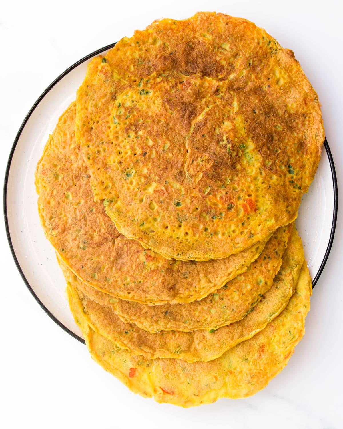 Large Chickpea Pancakes on Plate.