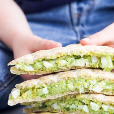 Avocado Egg Salad Sandwiches Cut and Stacked