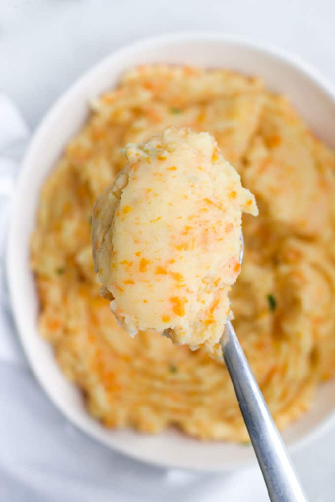 Potato and Carrot Mash on Serving Spoon