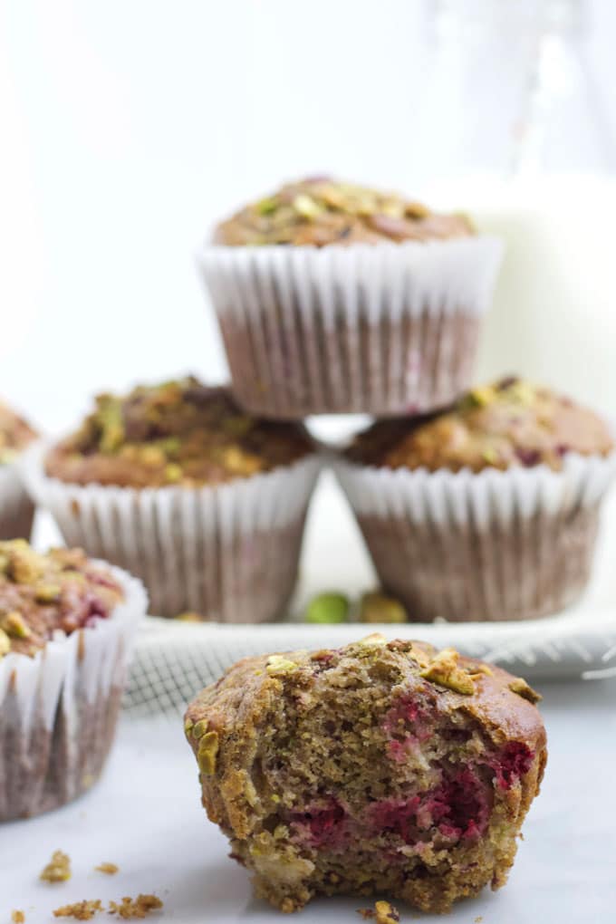 Pistachio and Raspberry Muffins one with Bite Taken Out