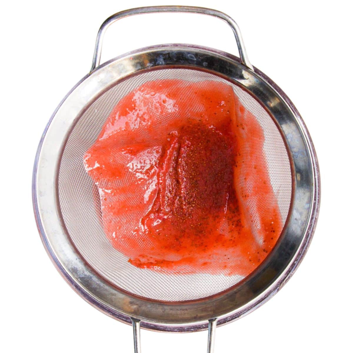 Sieve with Seeds Remaining After Puree Has Been Passed Through.