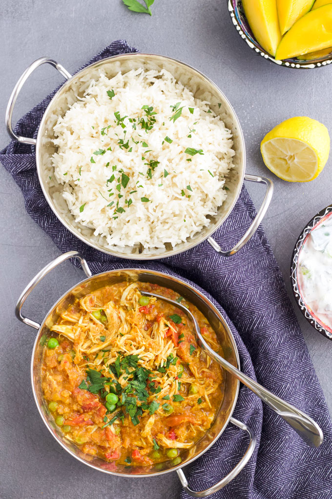 Slow Cooker Chicken Curry Served with Rice and Cucumber Dip