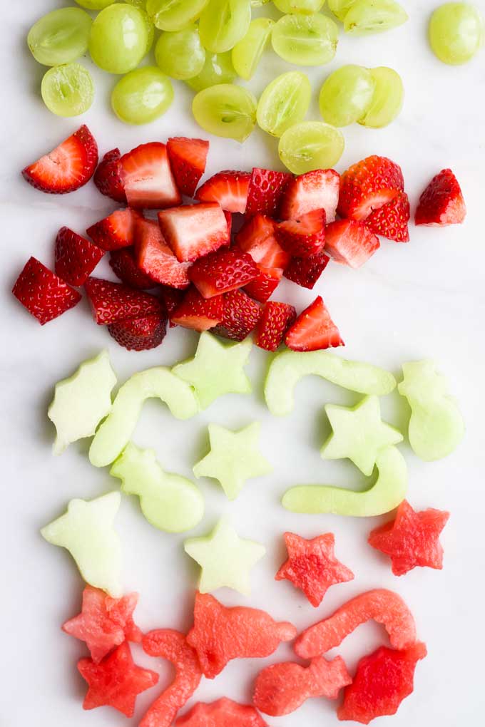 Selection of Red and Green Fruits Cut up for Fruit Salad