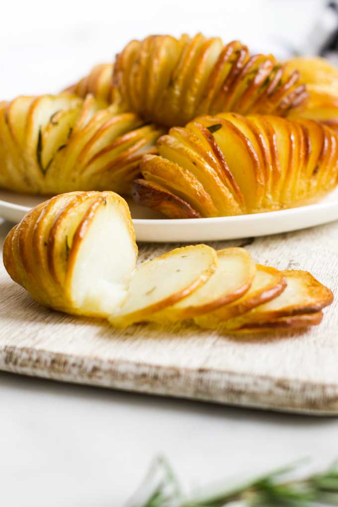 Hasselback Potatoes Sliced on Board