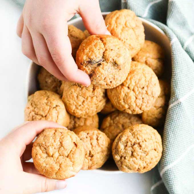 Children Grabbing Sweet Potato Muffins from Bowl