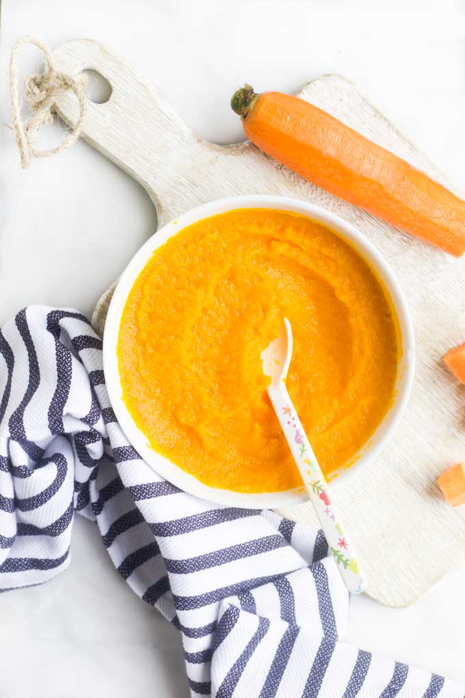 Carrot Puree in Bowl with Spoon