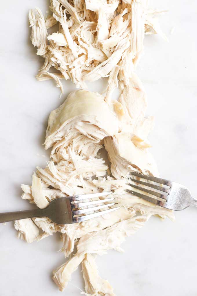 Shredding Chicken with Two Forks