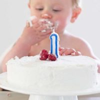 Baby Eating Healthy First Birthday Cake