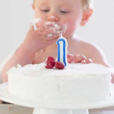 Baby Eating Healthy First Birthday Cake