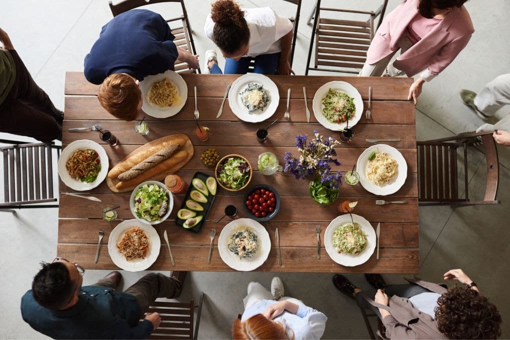 Family About to Sit Down to Family Meal