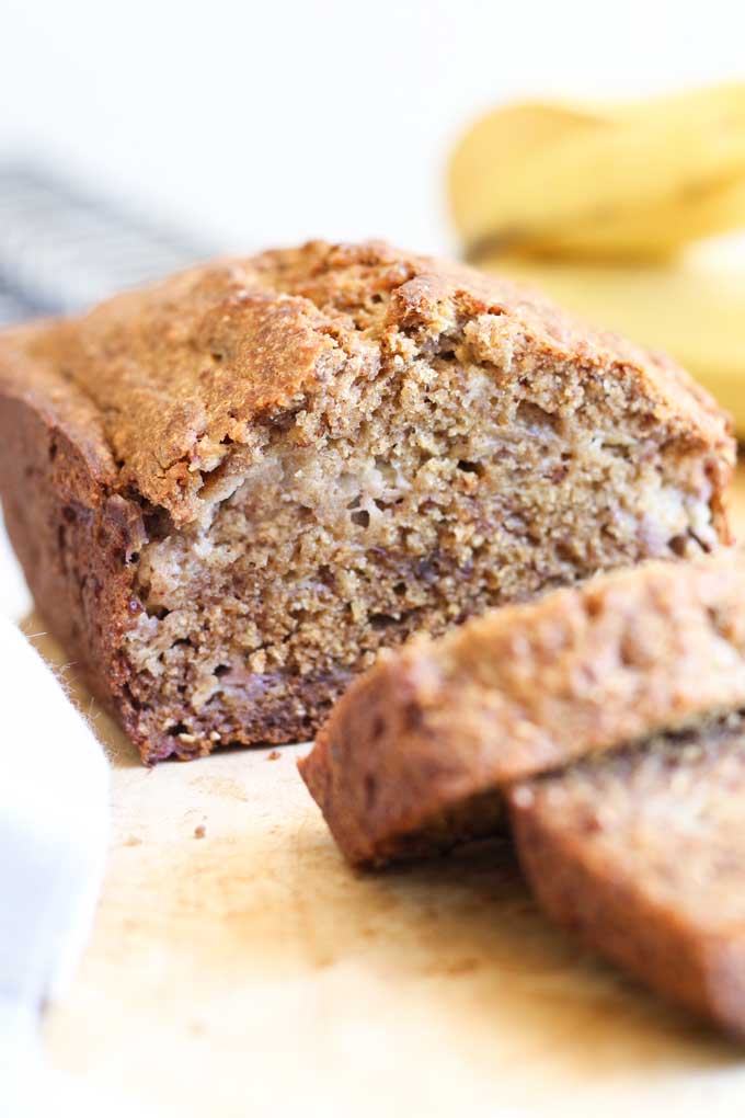 Healthy Banana Bread Cut on Wooden Chopping Board