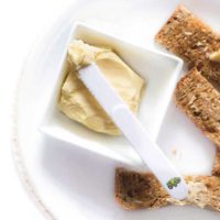 Dish of Homemade Butter with Kid's Knife and Toast Fingers