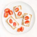 Crackers Topped with Cottage Cheese and Tomato Slices