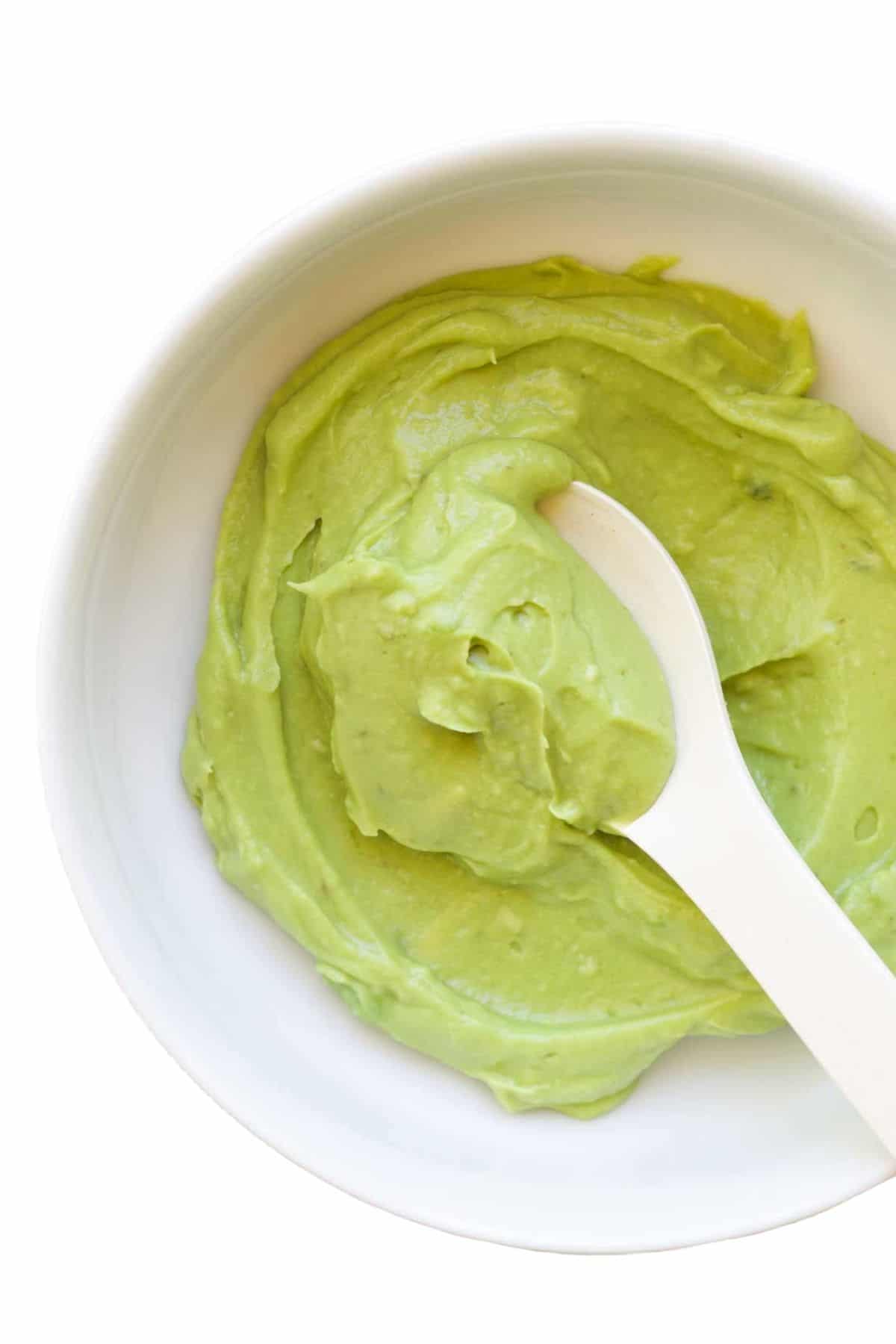 Avocado Puree in Bowl with Spoon